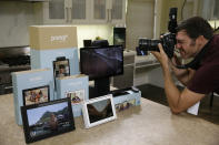 In this photo taken Tuesday, Sept. 17, 2019, new Facebook Portal products are displayed during an event in San Francisco. Facebook is slashing the price and the size of the Portal, its screen and camera-equipped gadget for making video calls with friends and family as it attempts to get the device into more homes. A smaller version will now cost $129 and have an 8 inch display. A larger version will cost $179 and have a 10 inch display. (AP Photo/Eric Risberg)