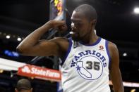 Dec 1, 2017; Orlando, FL, USA; Golden State Warriors forward Kevin Durant (35) flex his muscles as he made a basket in the act of getting fouled against the Orlando Magic during the second quarter at Amway Center. Mandatory Credit: Kim Klement-USA TODAY Sports