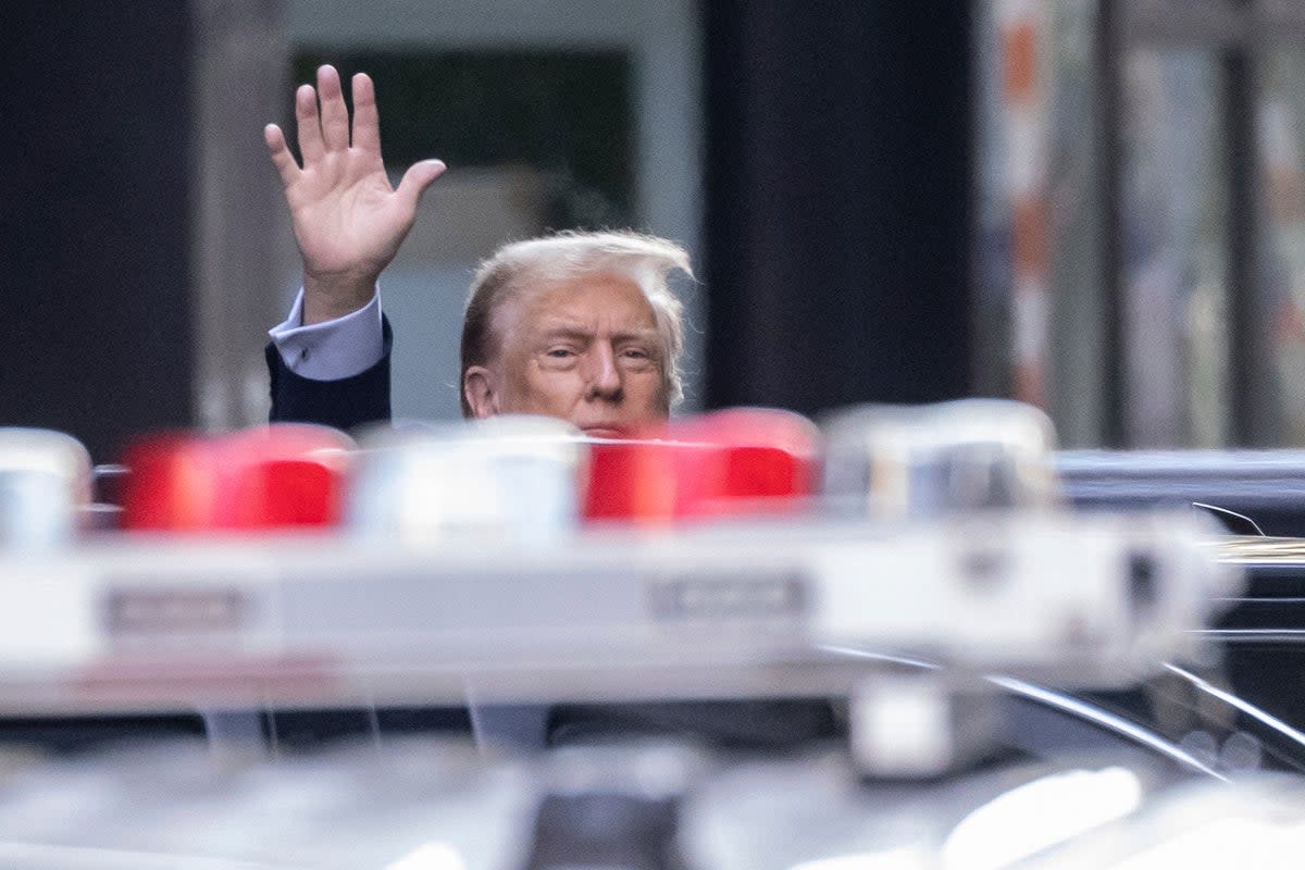 Donald Trump leaves Trump Tower on his way to Manhattan criminal court on Friday morning (EPA)