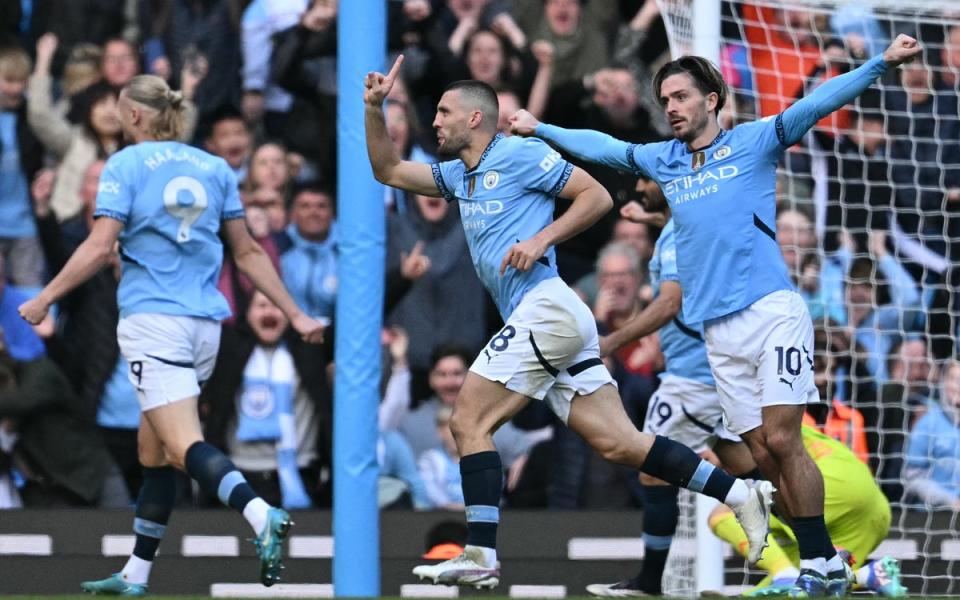 On target: Mateo Kovacic fired Manchester City to a win over Fulham (AFP via Getty Images)