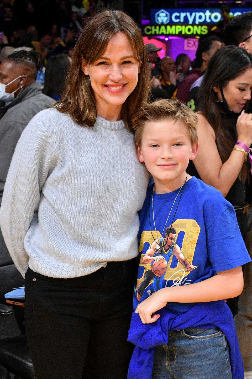 LOS ANGELES, CALIFORNIA - MARCH 05: Jennifer Garner and her son Samuel Garner Affleck attend a basketball game between the Los Angeles Lakers and the Golden State Warriors at Crypto.com Arena on March 05, 2023 in Los Angeles, California. (Photo by Allen Berezovsky/Getty Images)