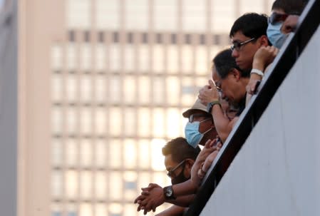 Students stage a rally to call for political reforms outside City Hall in Hong Kong