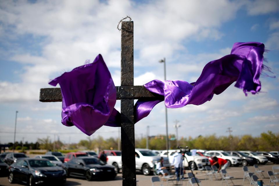 An Easter Cross is pictured during the Fifth Street Baptist Church's "Pull Up and Praise" Easter service at the parking lot of Millwood High School in Oklahoma City, Sunday, April 4, 2021.