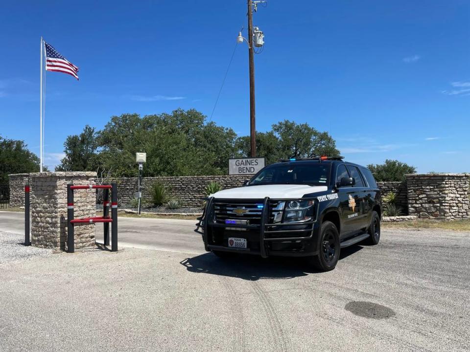 Texas state troopers block off entry to the Gaines Bend area on Friday, June 30, 2023, during a mandatory evacuation due to a wildfire.