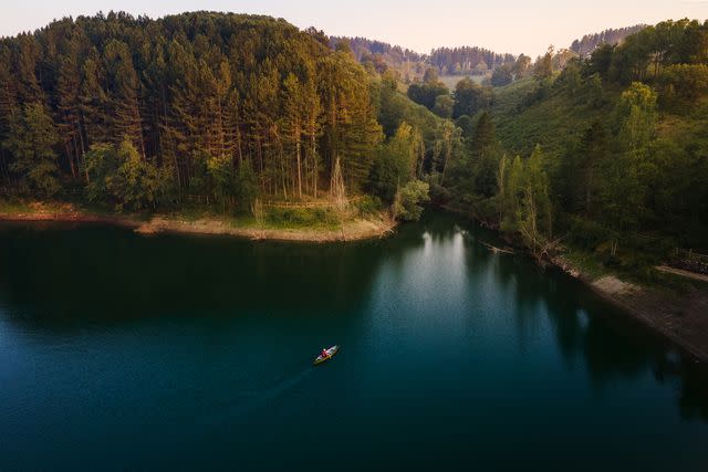 <p>Mattia Marasco/Courtesy of Oasyhotel</p> Kayaking on the nature reserveâ€™s man-made lake.