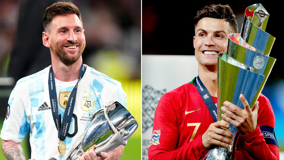 Pictured left to right, Lionel Messi and rival Cristiano Ronaldo holds trophies won with their respective national teams.