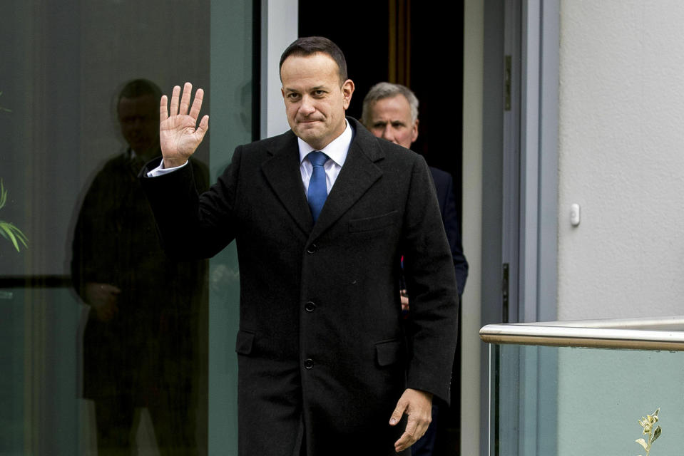 Irish Prime Minister Leo Varadkar waves as he walks to address the media ahead of talks with Northern Ireland's five main political parties at the Irish Government residence in Belfast, Friday Feb. 8, 2019. (Liam McBurney/PA via AP)