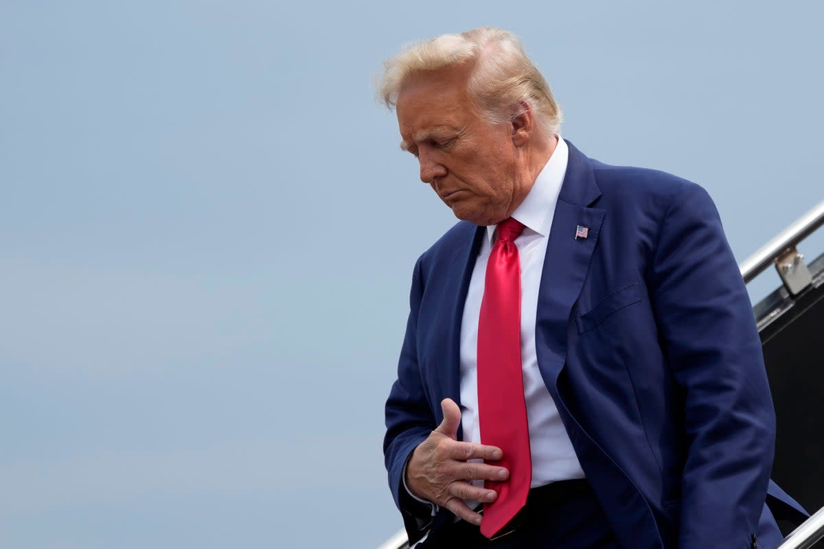 Former President Donald Trump arrives at Ronald Reagan Washington National Airport for his 3 August arraignment (Copyright 2023 The Associated Press. All rights reserved.)