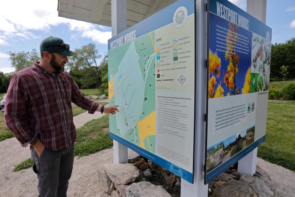 Ross Moran, Executive Director, points out the various trails available at the Adamsville Road location as Westport Land Conservation Trust celebrates its 50th anniversary