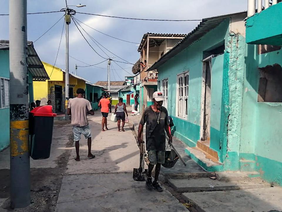 Locals walking on the streets on Santa Cruz del Islote in 2020.