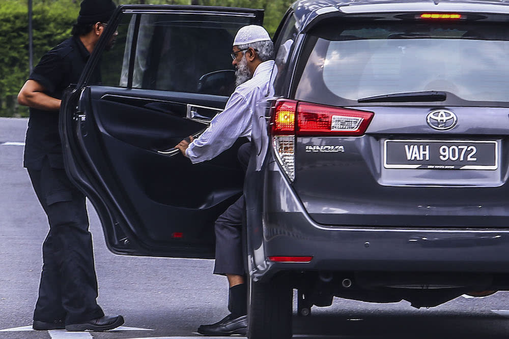 Dr Zakir Naik arrives at Bukit Aman police headquarters in Kuala Lumpur August 22, 2019. — Picture by Hari Anggara