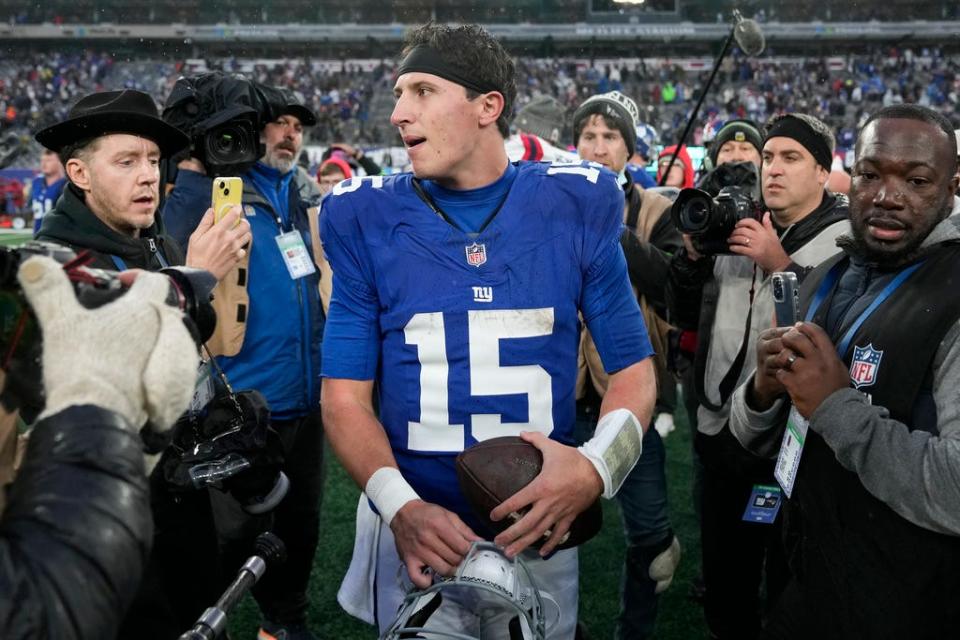 New York Giants quarterback Tommy DeVito (15) walks off the field after playing against the New England Patriots in an NFL football game, Sunday, Nov. 26, 2023, in East Rutherford, N.J. (AP Photo/Seth Wenig)