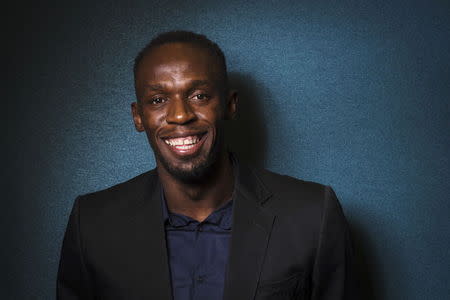 Usain Bolt poses for a portrait in New York June 11, 2015. REUTERS/Lucas Jackson