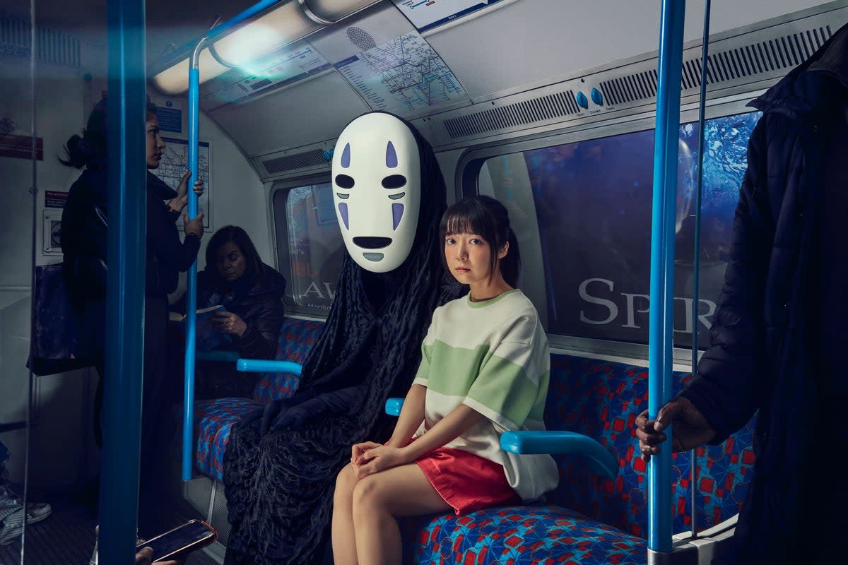 Kanna Hashimoto (Chihiro) and 'No-Face' from SPIRITED AWAY, on the London Underground (Jay Brooks)