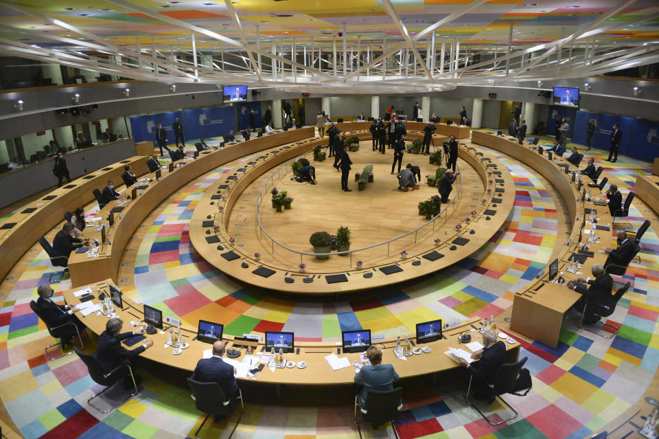 A general view of the round table meeting at an EU summit at the European Council building in Brussels, Thursday, Oct. 1, 2020. European Union leaders are meeting to address a series of foreign affairs issues ranging from Belarus to Turkey and tensions in the eastern Mediterranean. (Johanna Geron, Pool via AP)