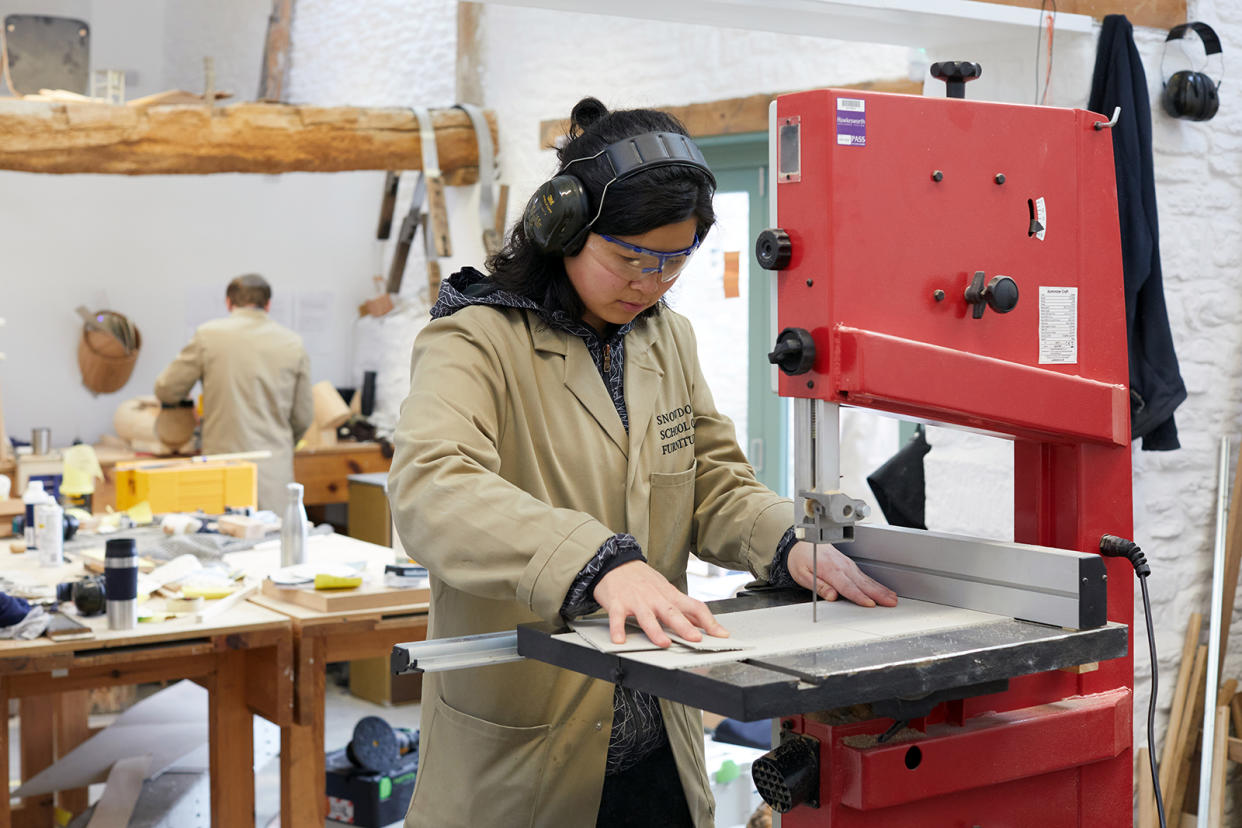 A furniture student at Barley Court workshops in Highgrove Gardens 