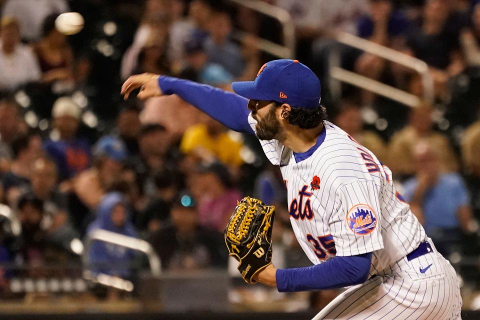 New York Mets' pitcher Colin Holderman delivers against the Washington Nationals during the fifth inning of a baseball game, Monday, May 30, 2022, in New York.