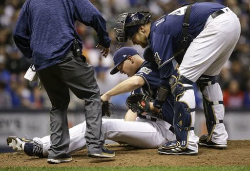 With Corey Knebel headed to the DL, the Brewers have an opening in the ninth inning (AP Photo/Tom Lynn)