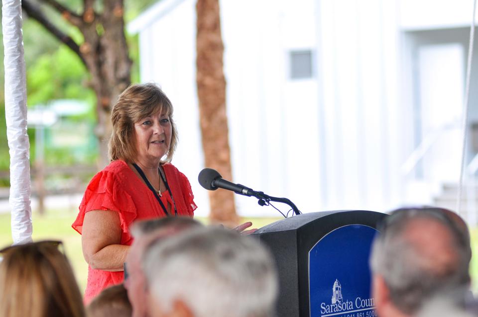 Debbie Marks, who is retiring as the administrator of the Englewood Community Redevelopment Agency, addresses the crowd during the groundbreaking ceremony for the Dearborn Street Improvement Project. She will retire Jan, 10, 2023, during the ribbon-cutting ceremony for the project.