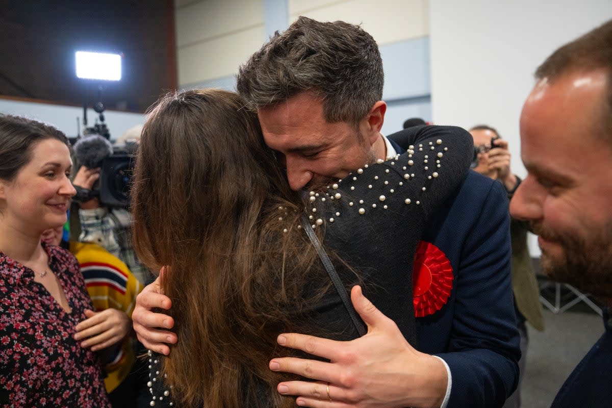 Labour Party candidate, Damien Egan, is hugged after being declared the winner in the Kingswood by-election  (Getty Images)
