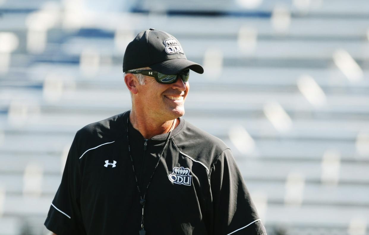 Old Dominion coach Bobby Wilder had a nice surprise for walk-on linebacker Marvin Branch. (AP Photo/Jason Hirschfeld)