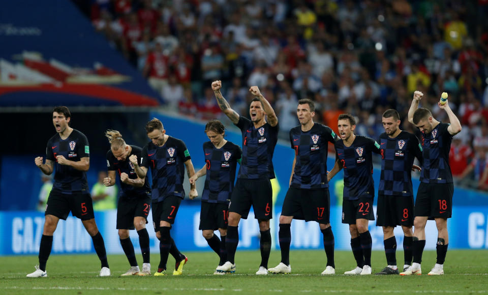 Soccer Football – World Cup – Quarter Final – Russia vs Croatia – Fisht Stadium, Sochi, Russia – July 7, 2018 Croatia players celebrate Croatia’s Marcelo Brozovic (not pictured) scoring a penalty during the shootout REUTERS/Carl Recine