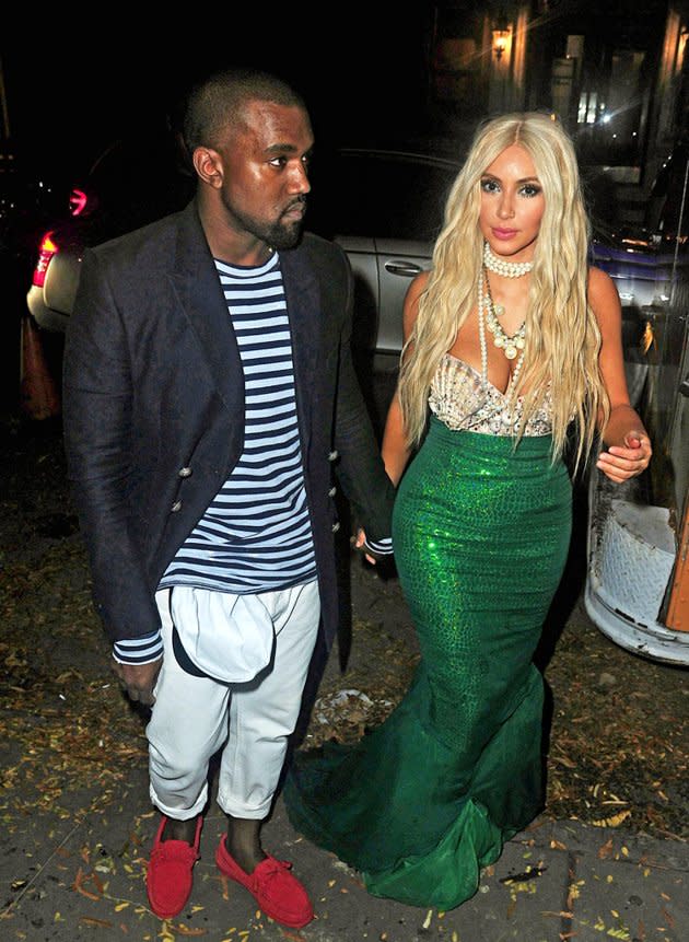 Kim Kardashian donned a glittering tail, seashell bodice, and a blond wig as she dressed up as a mermaid — more like the "Splash" mermaid Madison, not "The Little Mermaid's" Ariel, as she specified on her blog — when she hosted the 2nd Annual Midori Green Halloween at NYC club Avenue on Saturday. Kardashian's date, beau Kanye West, who often coordinates his look with his lady's, sported a nautical-themed ensemble. Anything Kardashian does to celebrate Halloween this year will be better than last, since October 31, 2011, was the date she filed for divorce from Kris Humphries! (10/27/2012)