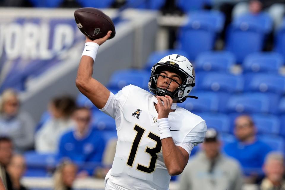 Central Florida quarterback Mikey Keene passes against Memphis in the first half of an NCAA college football game Saturday, Nov. 5, 2022, in Memphis, Tenn. (AP Photo/Mark Humphrey)