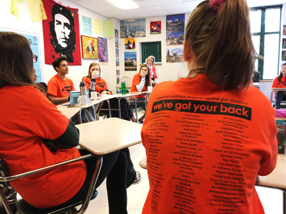 <p>Students discuss gun violence ahead of a walkout at East Chapel Hill High School on Wednesday, March 14, 2018, in Chapel Hill, N.C. (Photo: Jonathan Drew/AP) </p>