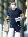 <p>Orlando Bloom was out and about in Montecito, California on Sunday, running errands and picking up coffee while wearing a mask.</p>