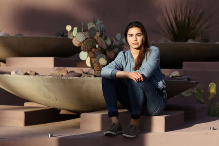 Former Biological Resource Center intern Emily Glynn, 24, poses for a portrait at the Arizona State University Art Museum in Tempe, Arizona, U.S., December 17, 2017. REUTERS/Caitlin O'Hara