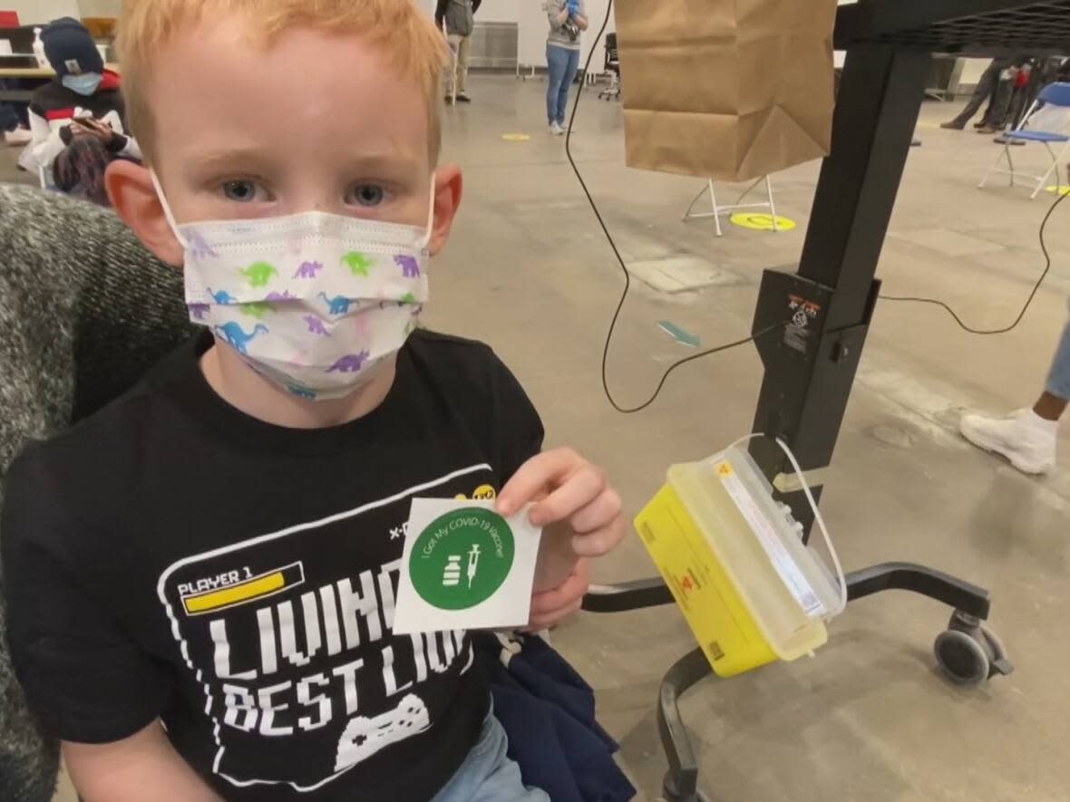 Drew Peppler, 8, got his first dose of the Pfizer pediatric vaccine on Wednesday in Regina.  (Trent Peppler - image credit)