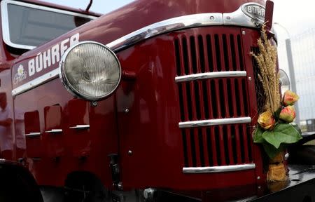 View of the old-time tractor in which three Swiss fans arrive from home to Kaliningrad stadium, to watch their team playing against Serbia, in Kaliningrad, Russia June 21, 2018. REUTERS/Mariana Bazo