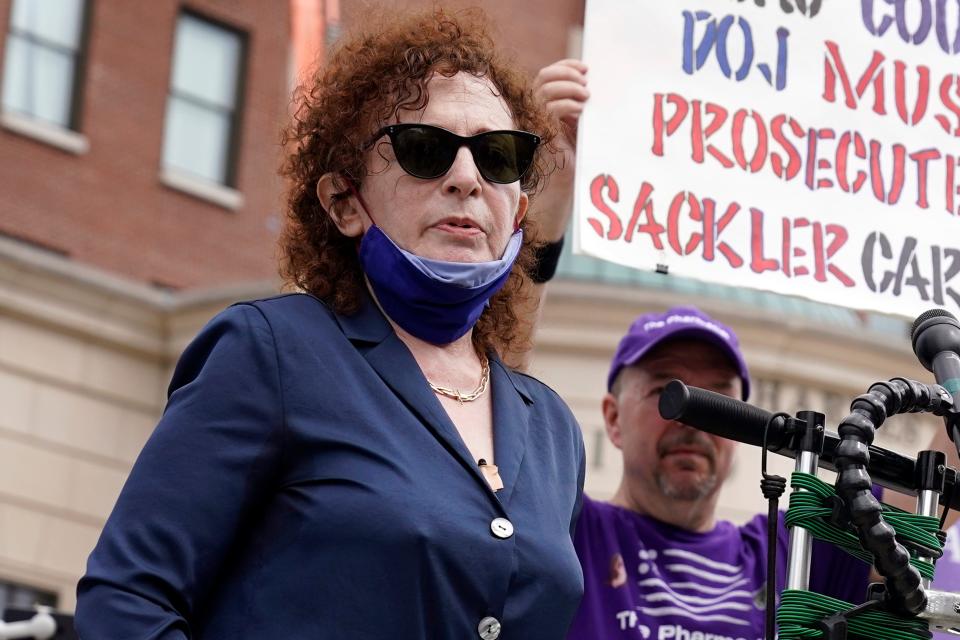 Photographer and activist Nan Goldin speaks during a protest in front of the courthouse where the Purdue Pharma bankruptcy took place in White Plains, N.Y., on Aug. 9, 2021. Goldin is the subject of the documentary "All the Beauty and the Bloodshed."
