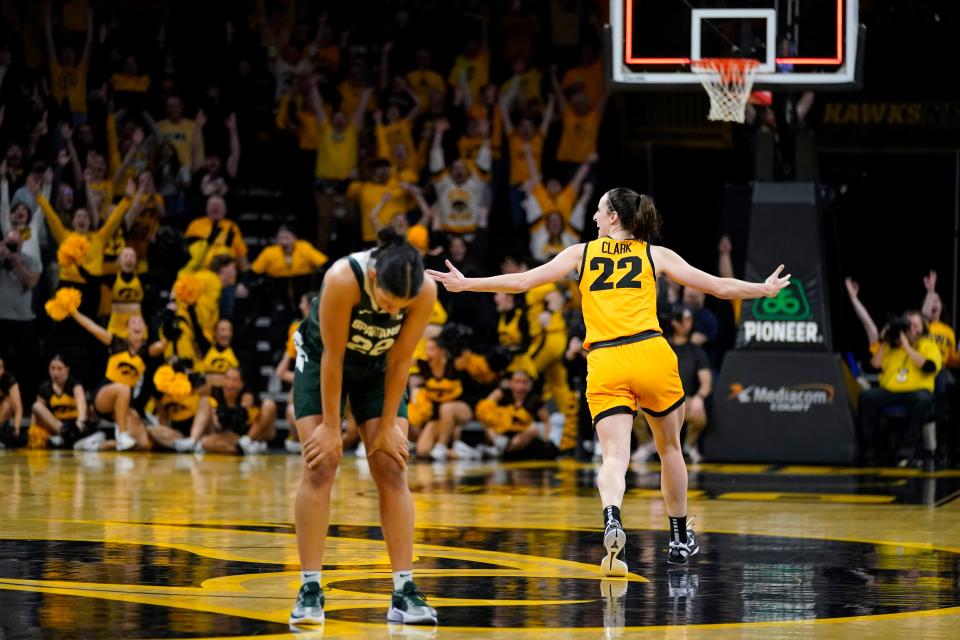 Iowa's Caitlin Clark celebrates after hitting a game-winning 3-pointer in a 76-73 win over Michigan State in Iowa City, Iowa.