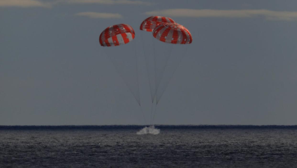 The Orion capsule from NASA's Artemis I mission splashes down. <a href="https://newsroom.ap.org/detail/NASA-Moonshot/13756aed8cb2435dbe1f698a8a9cc18c/photo?Query=rocket%20splashdown&mediaType=photo&sortBy=&dateRange=Anytime&totalCount=50&digitizationType=Digitized&currentItemNo=44&vs=true&vs=true" rel="nofollow noopener" target="_blank" data-ylk="slk:NASA via AP;elm:context_link;itc:0;sec:content-canvas" class="link ">NASA via AP</a>