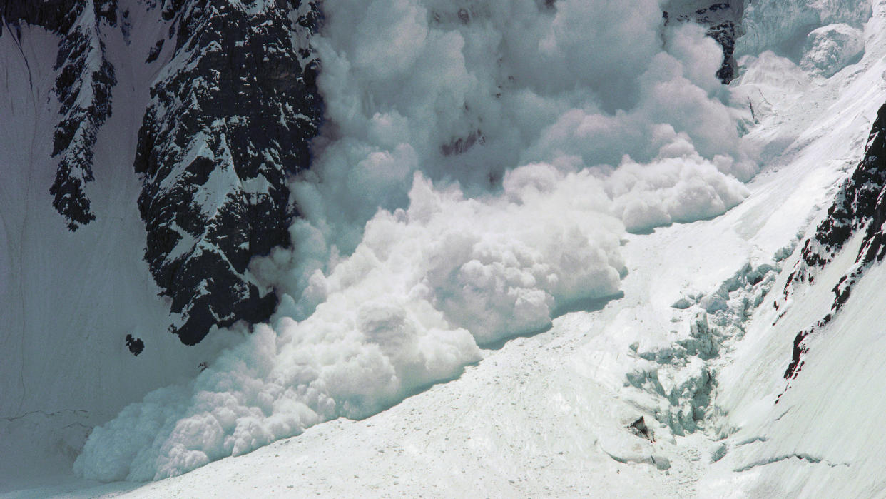  An avalanche crashes through the Savoia Pass on the northwest side of K2 in the Karakoram Range, Pakistan. 