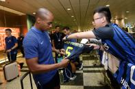 <p>Joao Mario of Inter Milan signs autograph for a fan </p>