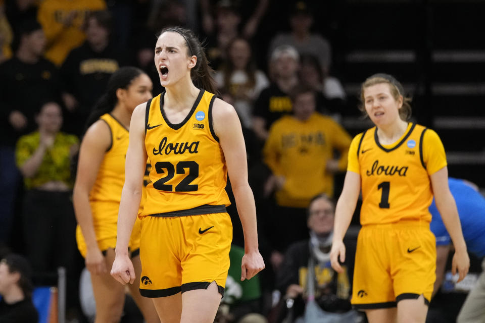 Iowa guard Caitlin Clark (22) celebrates in the first half of a first-round college basketball game against Southeastern Louisiana in the NCAA Tournament, Friday, March 17, 2023, in Iowa City, Iowa. (AP Photo/Charlie Neibergall)