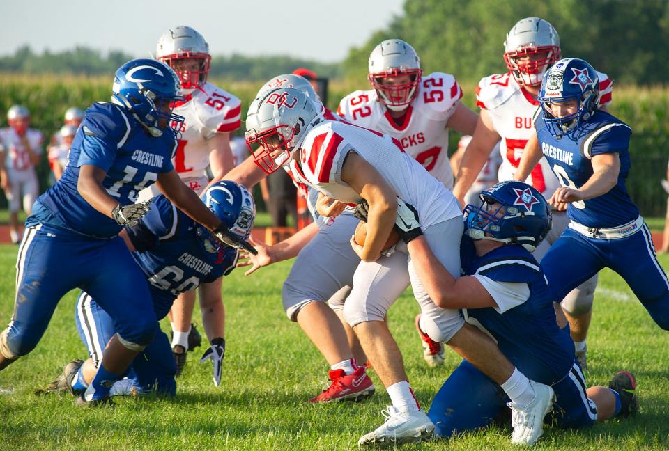 Buckeye Central's Dominic Dean gains yardage.