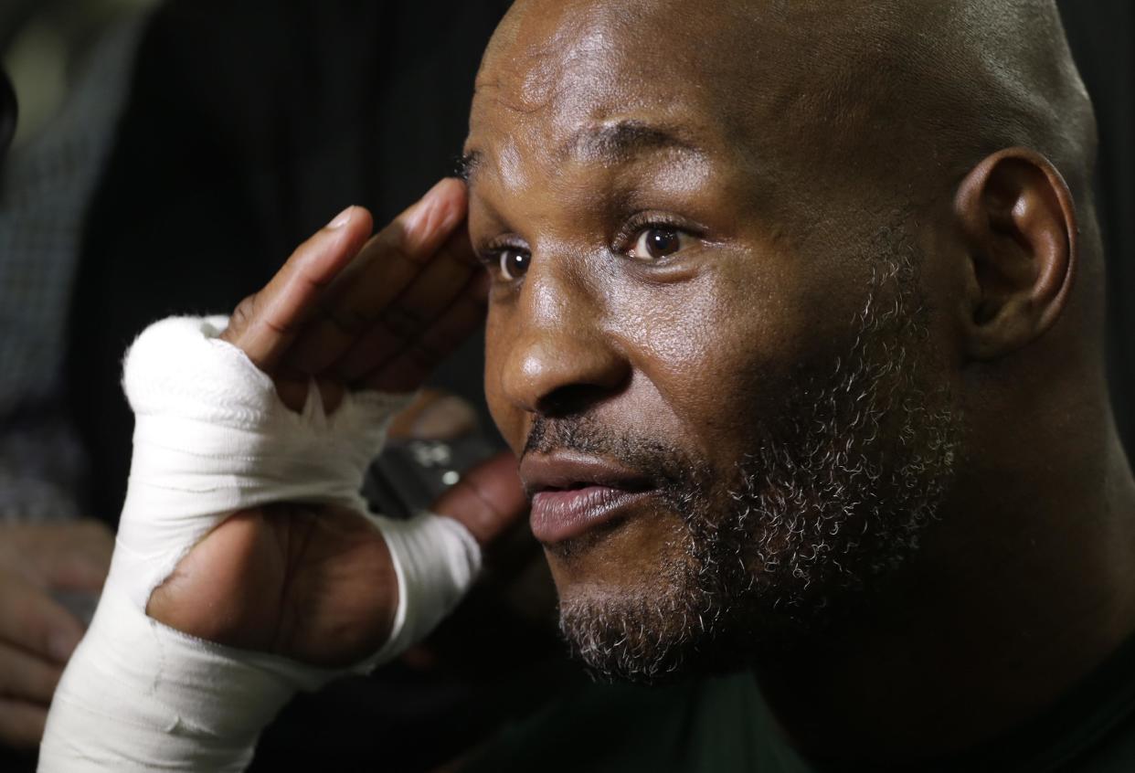 Boxer Bernard Hopkins talks to reporters before a workout at Gleason&#39;s Gym, Tuesday, Nov. 4, 2014 in the Brooklyn borough of New York. Hopkins fights Sergey Kovalev in a light heavyweight bout, Saturday, Nov. 8 in Atlantic City, N.J. (AP Photo/Mark Lennihan)