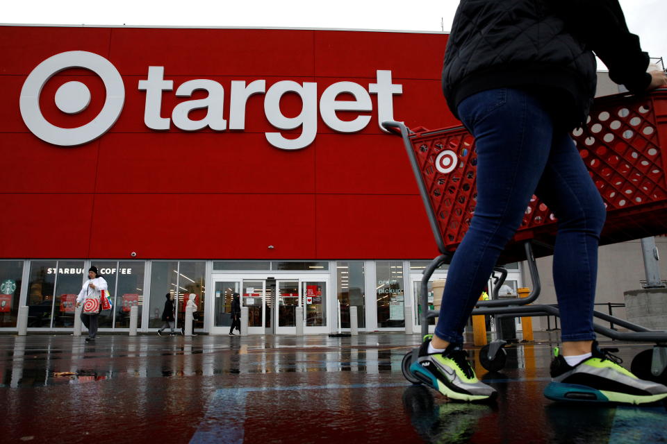 Shoppers exit a Target store during Black Friday sales in Brooklyn, New York, U.S., November 26, 2021.  REUTERS/Brendan McDermid