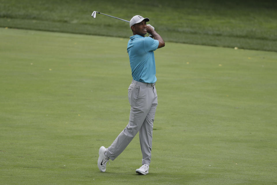 Tiger Woods hits from the fifth fairway during the first round of the Memorial golf tournament, Thursday, July 16, 2020, in Dublin, Ohio. (AP Photo/Darron Cummings)