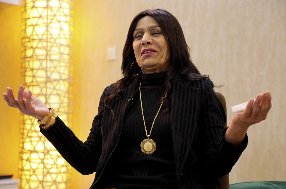 Iraqi Singer Sajda Obeid gives an interview to The Associated Press, in Irbil, Iraq, Friday, Dec. 10, 2021. Obeid said that she will never stop performing. For older Iraqis, the 63-year old is a symbol of a bygone golden era. To the young, her upbeat love songs and subtly racy lyrics have become a channel for self-expression in a largely conservative society. (AP Photo/Hussein Ibrahim)