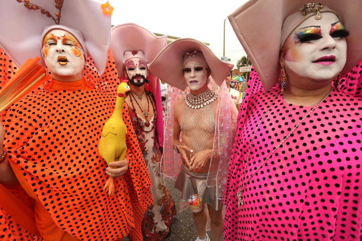 Members of the Sisters of Perpetual Indulgence Los Angeles celebrating in brightly colored garb