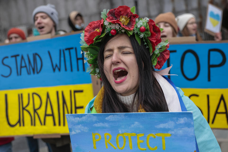 NEW YORK - NEW YORK - MARCH 1: A woman shouts slogans against war as she takes part in a protest against the Russia's invasion over Ukraine outside the United Nations Headquarters on March 1, 2022. Russian troops besiege eastern Ukraine and President Zelensky asked president Biden to 