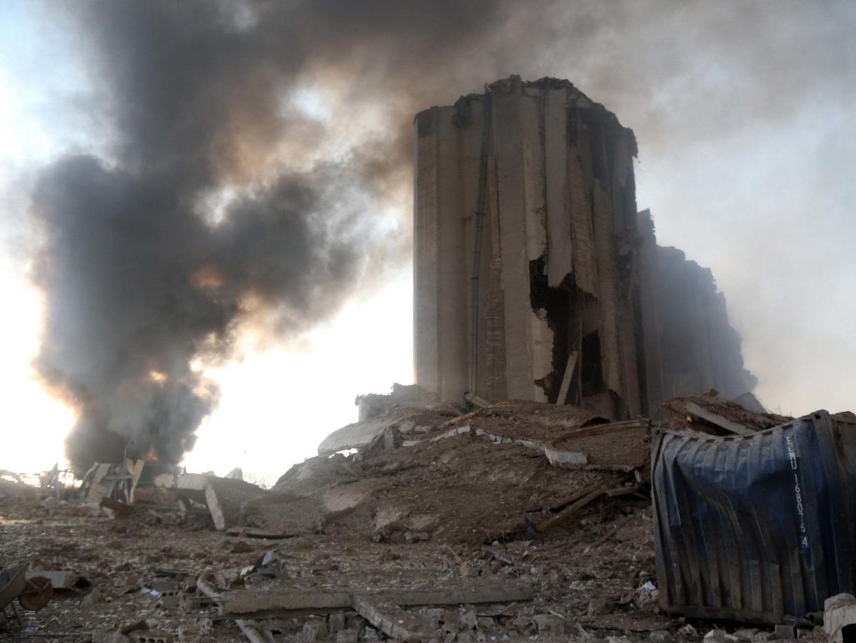 Smoke rises near a destroyed grain silo: EPA