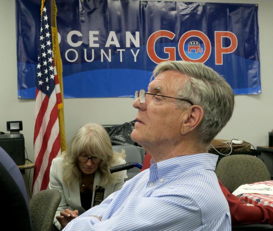 Ocean County GOP Chairman George R. Gilmore watches primary election night returns at their headquarters in Toms River.