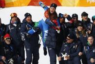 Alpine Skiing - Pyeongchang 2018 Winter Olympics - Women's Downhill - Jeongseon Alpine Centre - Pyeongchang, South Korea - February 21, 2018 - Gold medallist Sofia Goggia of Italy celebrates with her coaches and team members. REUTERS/Leonhard Foeger