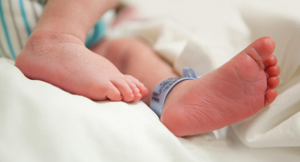 Photo shows image of an unidentified baby's feet.